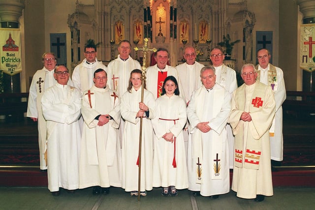 1998: Fr William Naylor, Parish Priest of St Patrick's RC Church, Hardybutts, centre, is pictured with some of his predecessors and other priests from around Wigan, after a special mass, held to celebrate St Patrick's Day.  This years celebration was particularly special as the parish is celebrating it's 150th year.  To mark the milestone fundraising events have been taking place over the past 18 months, raising £57,000, so far, for church improvements.