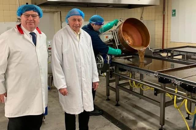 Joseph Thomas with Wm Santus co-director John Winnard on the factory floor