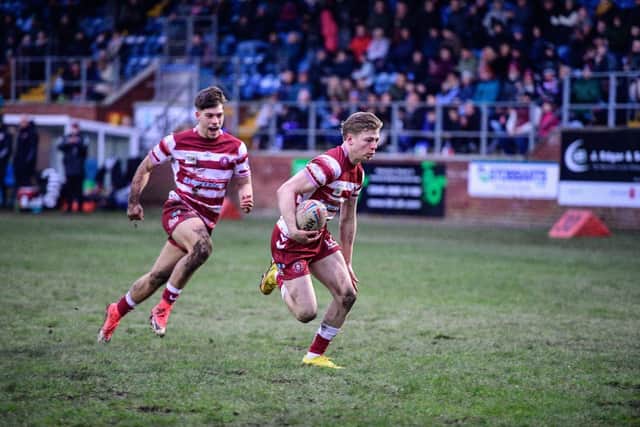 Logan Astley went over for two tries for Wigan