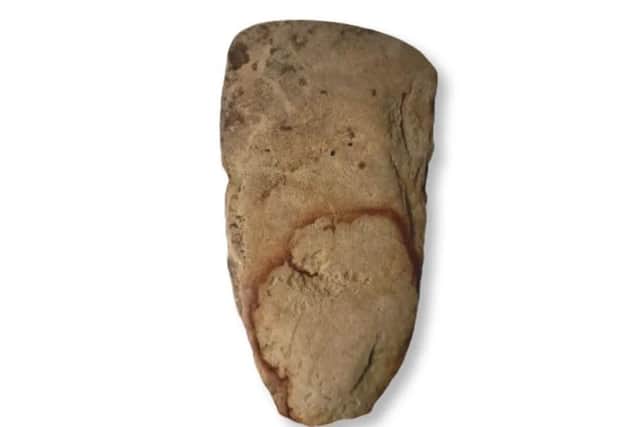 The hand axe unearthed in Aspull by Wigan Archaeology Society