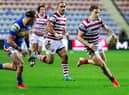 Wigan Warriors will face Leeds Rhinos in the play-off semi-final