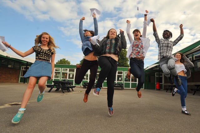JUMPING FOR JOY: Students get their GCSE result at The Deanery, Wigan.