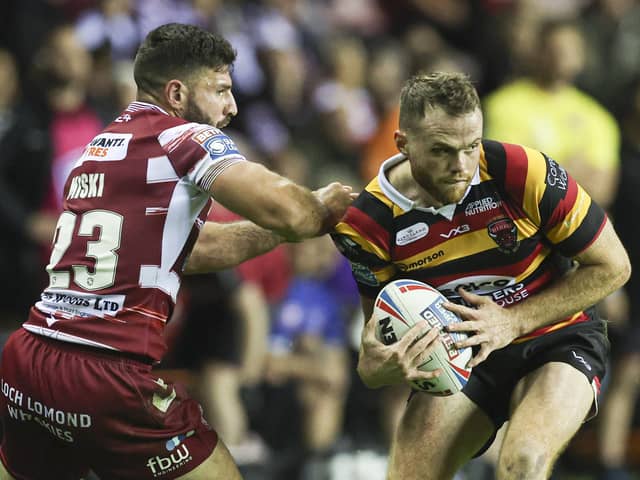Joe Burgess made more than 100 appearances for Wigan Warriors across two stints