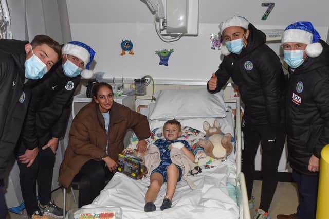 Callum Lang, Jamie Jones, Thelo Aasgaard and Mal Brannigan meet one of the patients