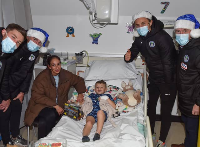Callum Lang, Jamie Jones, Thelo Aasgaard and Mal Brannigan meet one of the patients