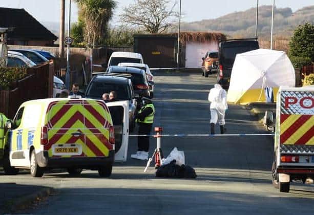 Police at the scene on Kilburn Drive where the body of Liam Smith was discovered