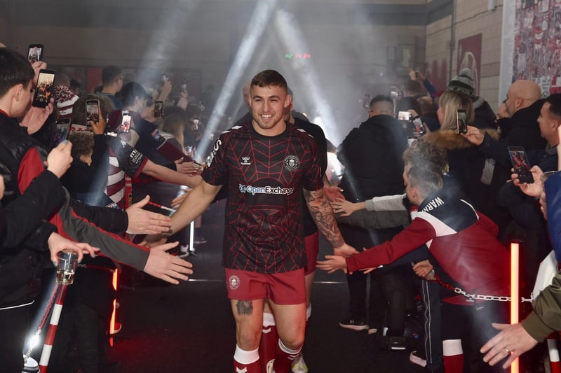 Sam Powell led the Wigan Warriors players through the Robin Park Arena fan zone ahead of the warm-up.