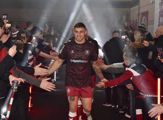 Sam Powell led the Wigan Warriors players through the Robin Park Arena fan zone ahead of the warm-up.