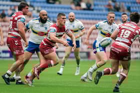 Wigan Warriors take on Salford Red Devils on Sunday