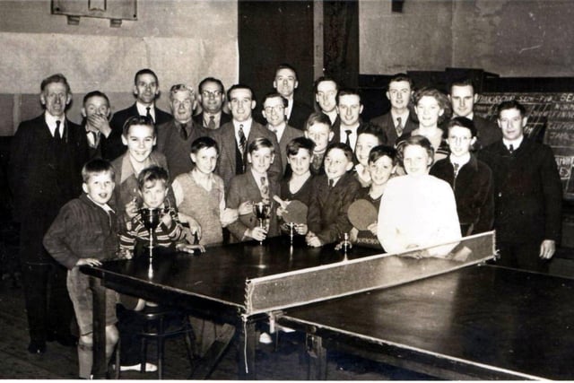 RETRO - LEISURE - Bamfurlong Methodist Church Sunday School. We had table tennis competitions, three of my brothers, Kevin ,Walter and Herbert James are on the photo, also Tommy Groves (centre back).   Tommy worked for the Wigan Observer, he presented the cups and trophies to the winners. The photo was taken sometime in the 1950's. Sent in by Ruth Bradley.