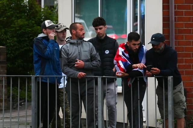 A group of men who had come to demonstrate