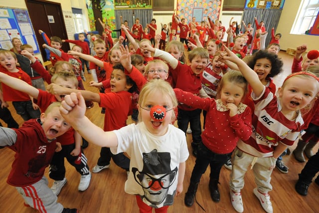 2013 - Pupils at RL Hughes Primary School, Ashton, dressed in red for their Red Nose Day 'Danceathon' in aid of Comic Relief