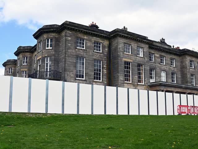 A fenced-off Haigh Hall as renovations continue