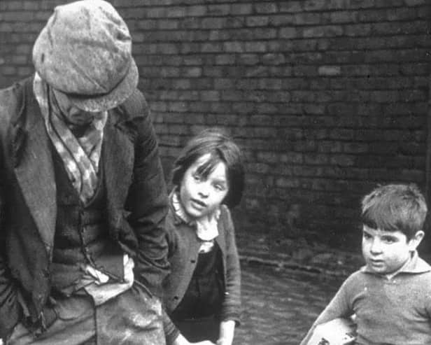 Wigan Street Corner 1939. The family has never been identified.