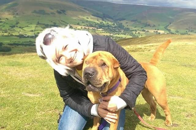 Kat Kuczynska with her dog, Diesel walking in the Peak District in 2015