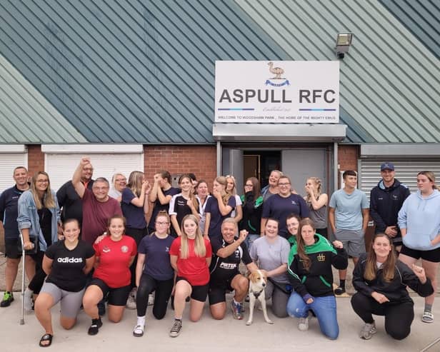 Members of Aspull RUFC celebrate with ward councillors