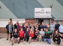Members of Aspull RUFC celebrate with ward councillors
