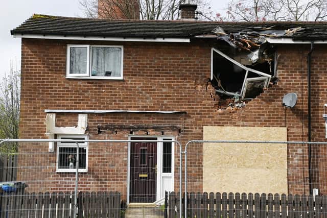 The house on Flapper Fold Lane, Atherton, after a crane overturned and hit it