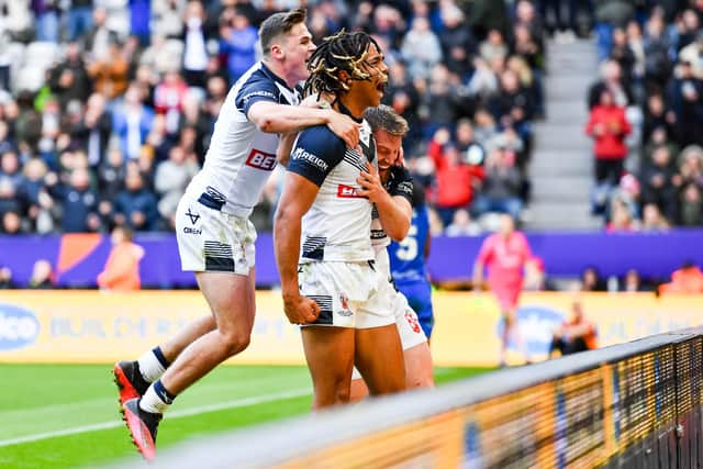 Dom Young celebrates his try against Samoa