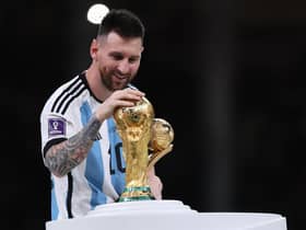 Lionel Messi with the World Cup