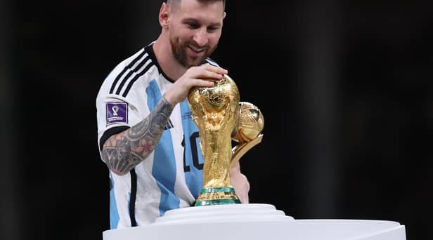 Lionel Messi with the World Cup