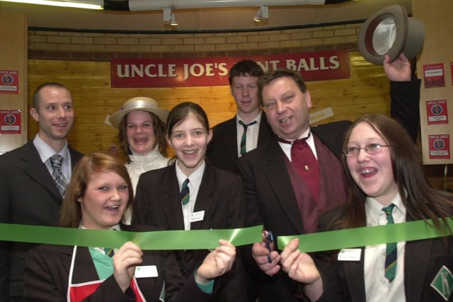 John Winnard officially opens the Uncle Joes on the new mall at PEMBEC watched by pupils Lisa Turton, Claire Rogers Chloe Johnson Daniel Littler and staff Anita Taulty and Carl Taulty.