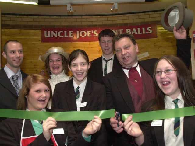 John Winnard officially opens the Uncle Joes on the new mall at PEMBEC watched by pupils Lisa Turton, Claire Rogers Chloe Johnson Daniel Littler and staff Anita Taulty and Carl Taulty.