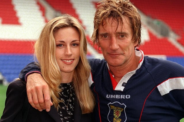 Rod Stewart - he played football in a celebrity football match to launch the new JJB Stadium 22 years ago The singer is pictured with our reporter Paula Langin.