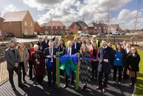 MP James Grundy cuts the ribbon to open a play area at North Leigh Park