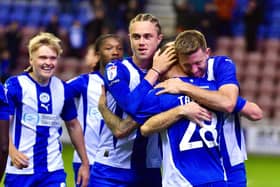 Dale Taylor gets the plaudits after scoring his - and Latics' - second goal against Peterborough