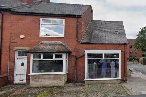 The shop frontages on Mesnes Road, Wigan