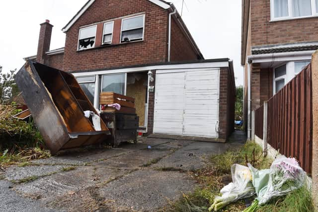 Flowers left outside the Newstead Road home of care worker Andy Pickwell, who died in the fire there