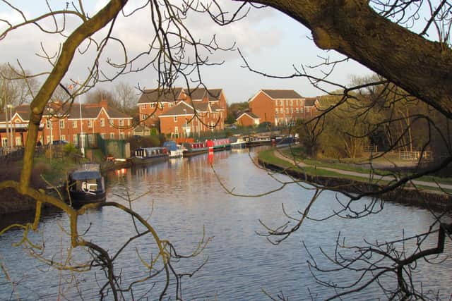 Woman's body found in Wigan canal