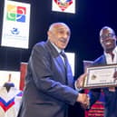 Billy Boston MBE presents Martin Offiah MBE with his Rugby League Lions Association heritage certificate