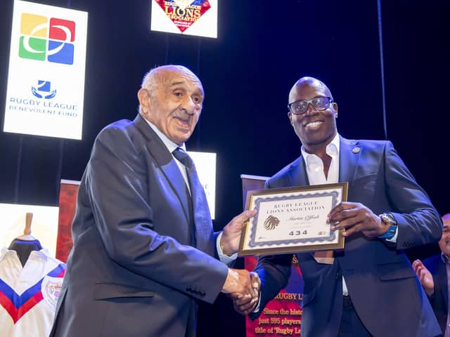 Billy Boston MBE presents Martin Offiah MBE with his Rugby League Lions Association heritage certificate