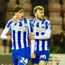 Callum McManaman congratulates Luke Chambers after his equaliser against Cheltenham