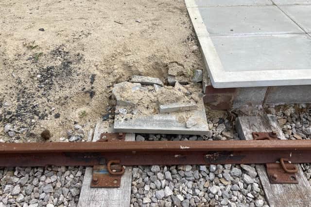 The smashed concrete on the Mining Museum station platform