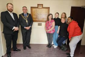 Hindley Green councillor James Palmer and Mayor of Wigan Coun Kevin Anderson at the unveiling of the refurbished plaque at The Bethel Community Centre