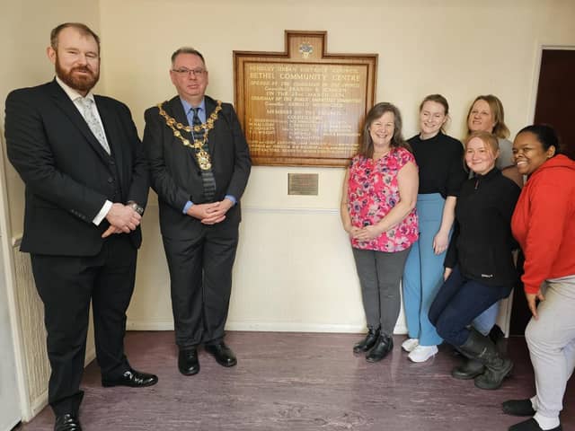 Hindley Green councillor James Palmer and Mayor of Wigan Coun Kevin Anderson at the unveiling of the refurbished plaque at The Bethel Community Centre
