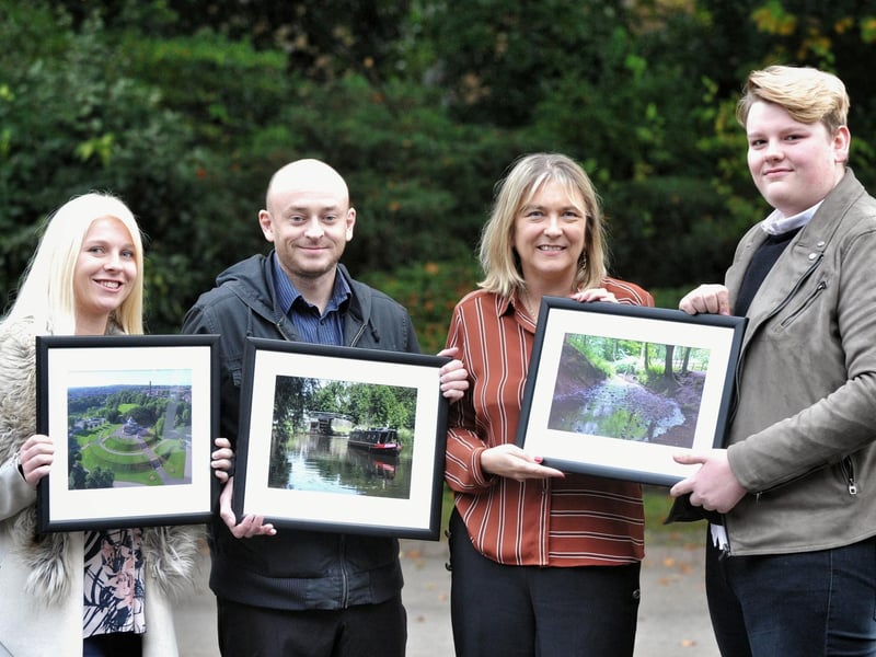 Wigan in Photos winners at Fairhurst Accountants, Wigan, pictured left, Danielle Banks accepting third prize on behalf of her grandfather Brian King, Gareth Jones, second prize, Jane Dennis, partner presenting and first prize winner, Nathan Farrimond
