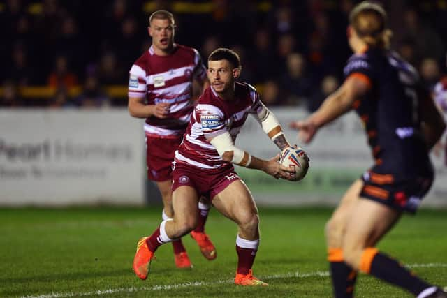 Cade Cust in action for Wigan Warriors