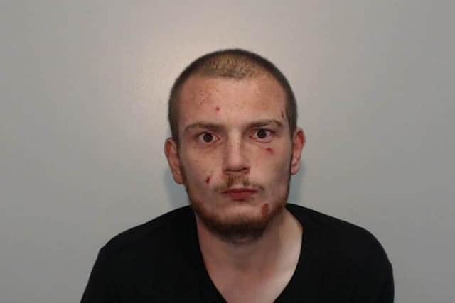 Notorious Wigan robber and thief is sent down for more than two years