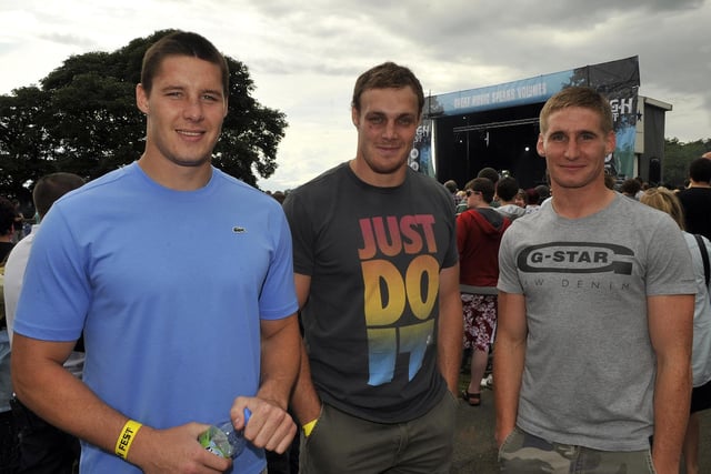 Wigan Warriors players, from left,  Joel Tomkins, Paul Prescott and Sam Tomkins enjoy the show.