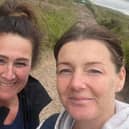 Pam McDonald on the left and Anne Noone on the right trekking