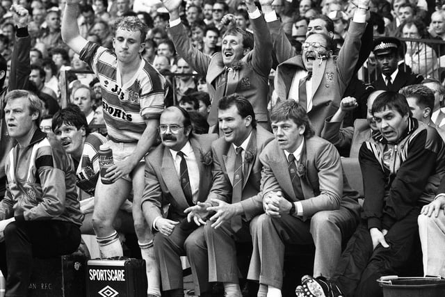 The Wigan bench celebrate at the final whistle after beating Halifax in the Challenge Cup Final at Wembley on Saturday 29th of April 1988. Wigan won the match 32-12.