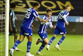 Callum Lang celebrates his goal - his first in over a year - as Latics hit a magnificent seven