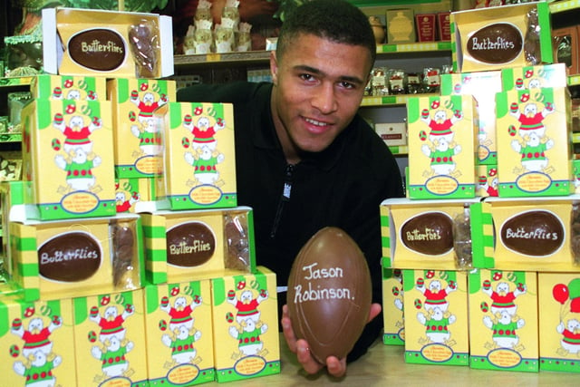 Jason Robinson patron of the Butterflies charity with some of the 300 Easter eggs from Thorntons  given to children.