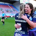 Jade Gregory-Haselden (right) and Ellise Derbyshire (left) celebrate Wigan Warriors' win over York Valkyrie in the opening game of the 2025 Women's Super League season