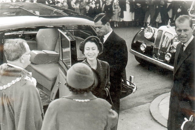 The Queen accompanied by the Duke of Edinburgh arrives in Wigan in 1954 the year after her Coronation