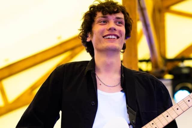 Jacob Maguire, 23, from Orrell, performing in the band
